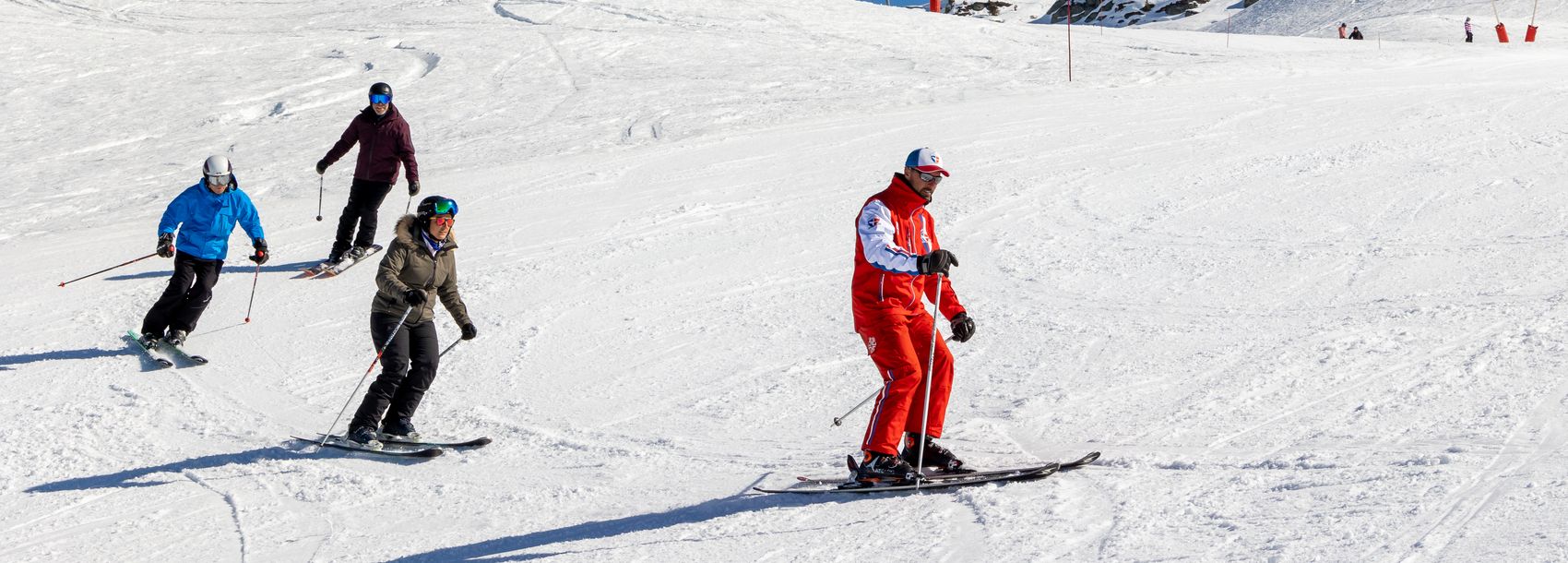 Cours de ski privé, un moniteur avec 3 élèves