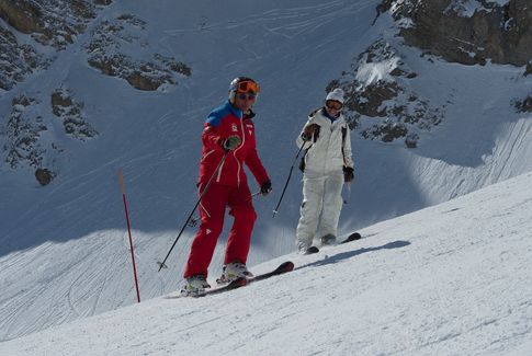 Skieur adulte en leçon à Courchevel