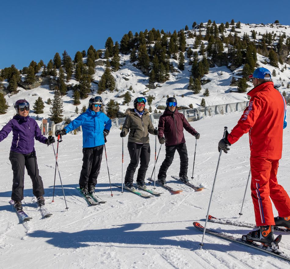 Groupe de skieur avec un moniteur